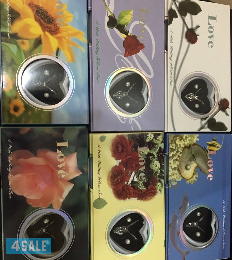 عقد اللؤلؤ +  ورد مطلي ذهب عيار 245