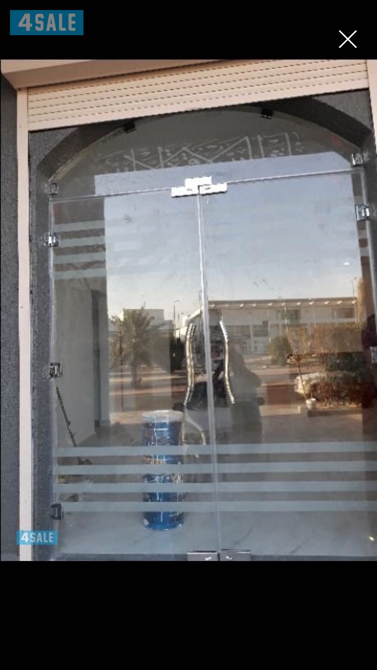 فني زجاج   ٦٦٤٩٢٨٤١4