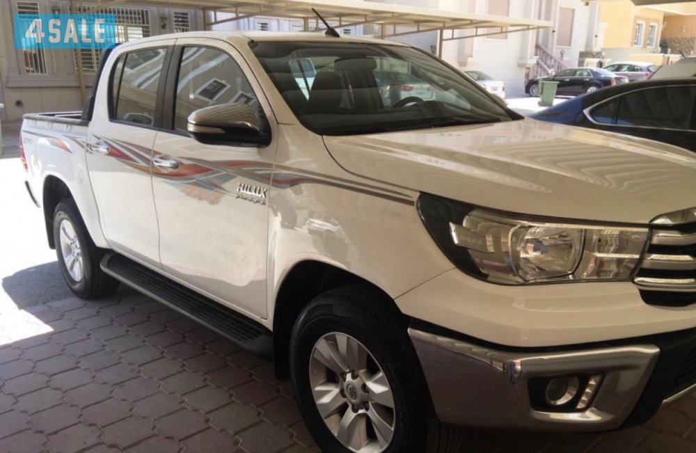 للبيع هايلكس موديل 2016 شرط الفحص ابيض من داخل عنابي ماشي 1500001