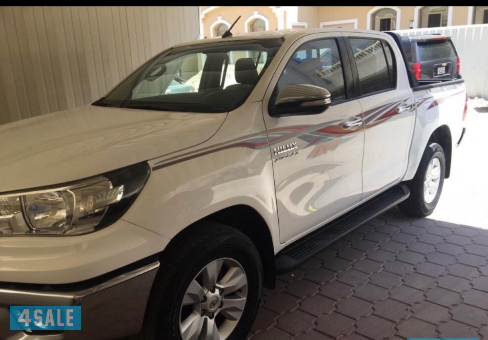 للبيع هايلكس موديل 2016 شرط الفحص ابيض من داخل عنابي ماشي 1500002