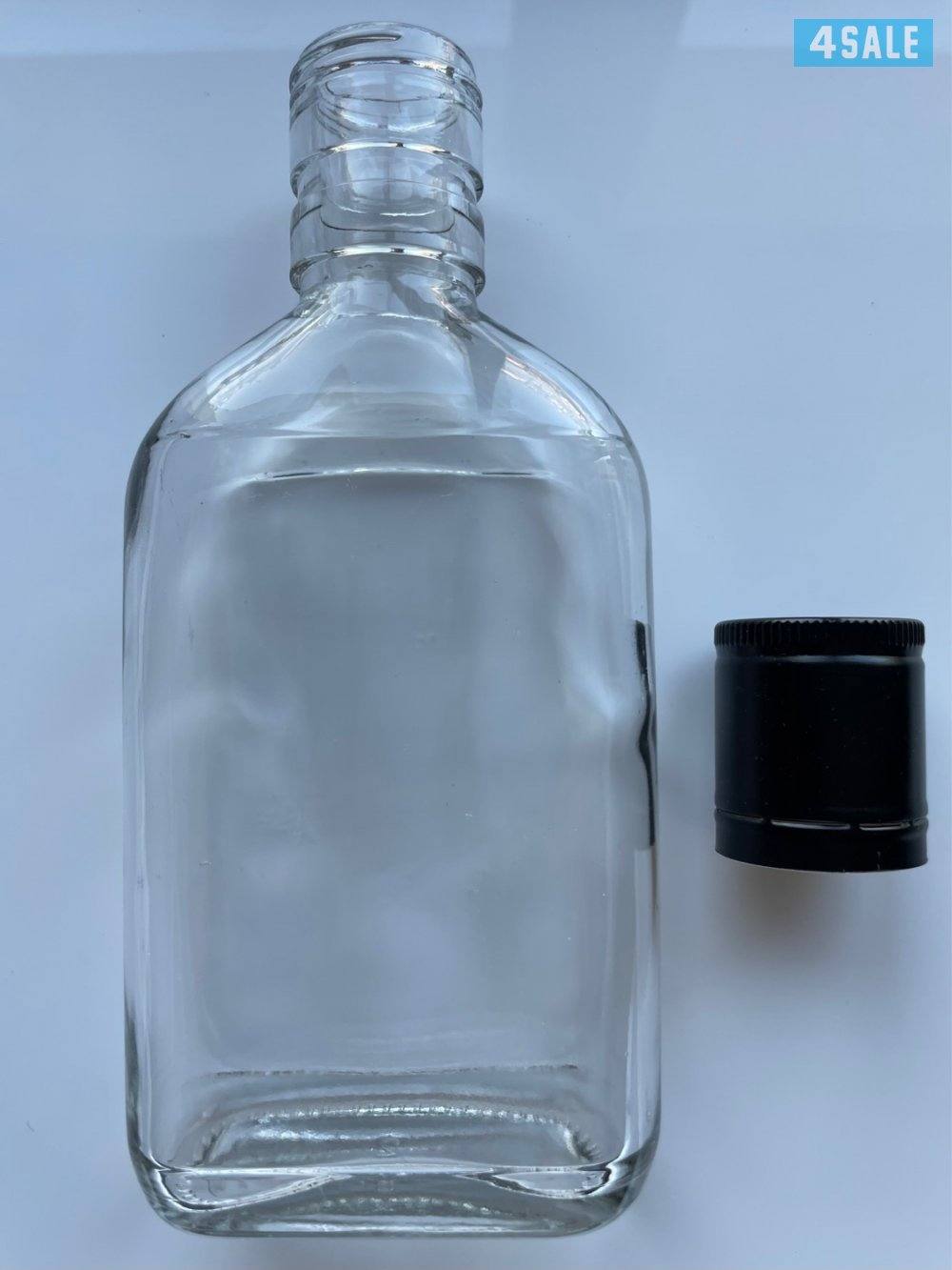 للبيع جملة قارورات (بطول) زجاجية عدد (2950) حبة مع اغطية سوداء (كبس)0