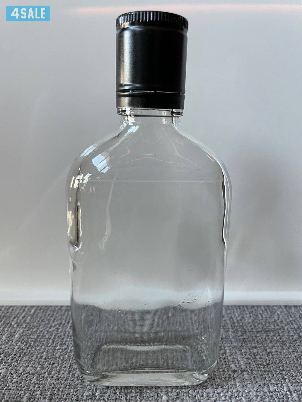 للبيع جملة قارورات (بطول) زجاجية عدد (2950) حبة مع اغطية سوداء (كبس)1