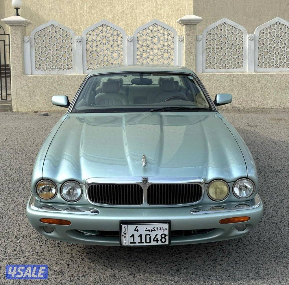 بحالة ممتازة صبغ الوكالة جاكور XJ8 موديل 1998 ماشي 216 مكيف تواير جديد0
