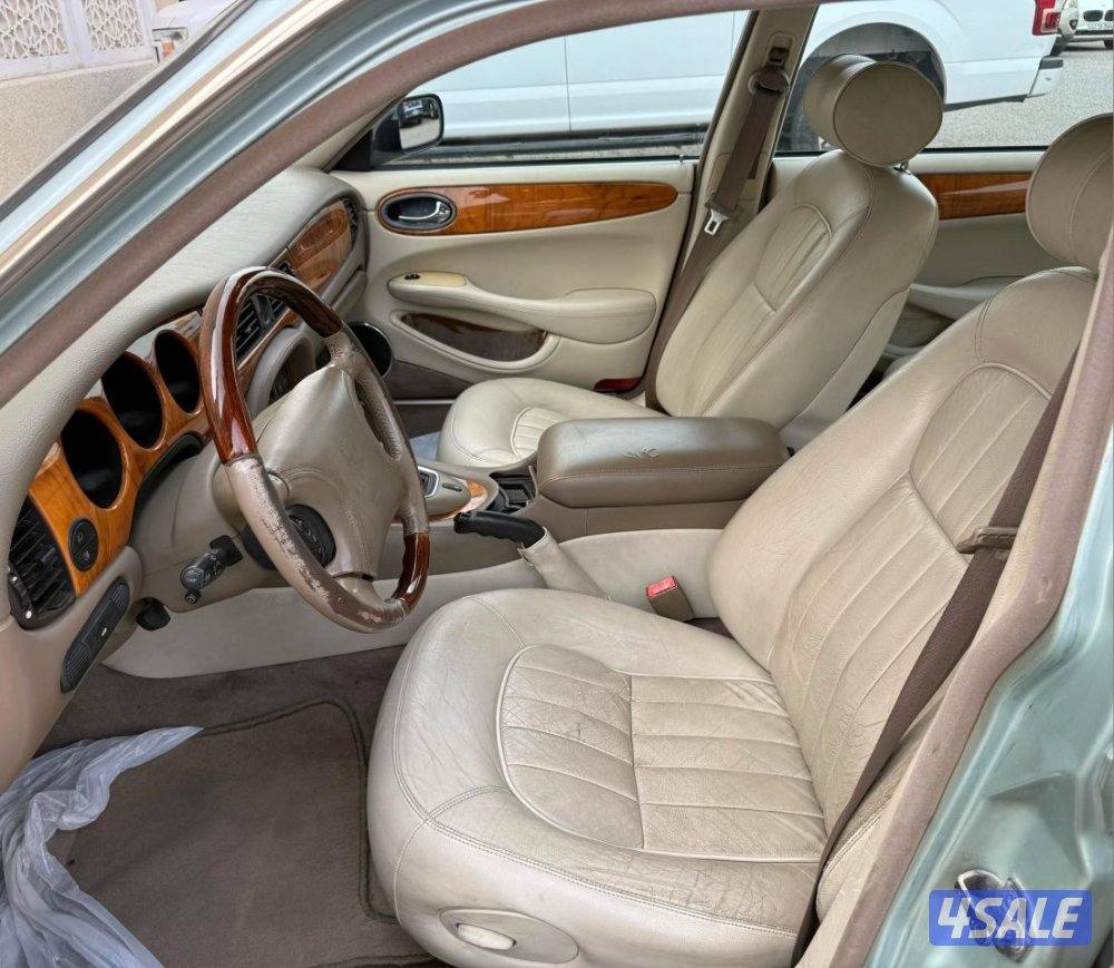 بحالة ممتازة صبغ الوكالة جاكور XJ8 موديل 1998 ماشي 216 مكيف تواير جديد11