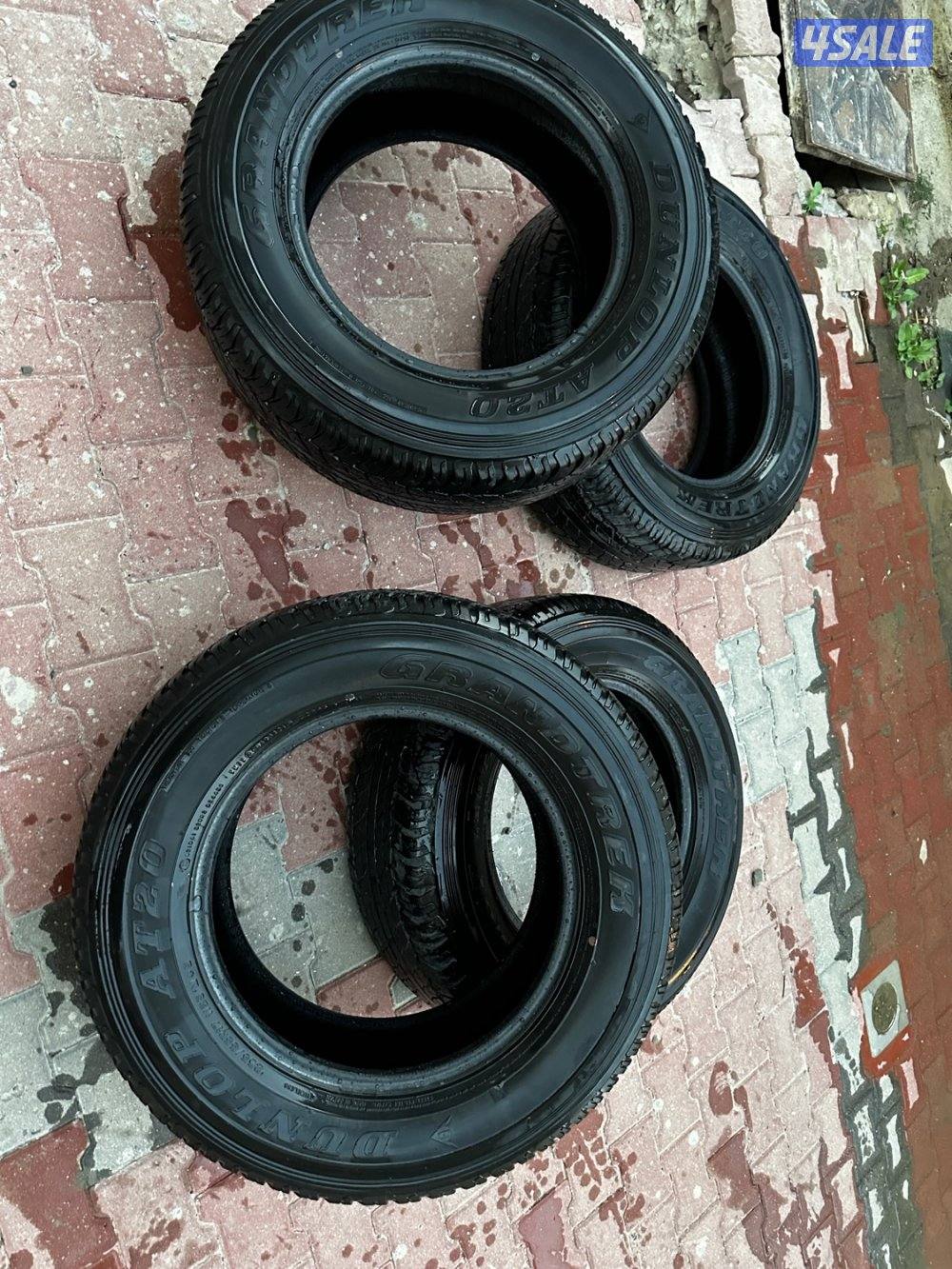 للبيع 4 رنقات وكاله للجيب رانقلر و 4 تواير دونلوب AT203