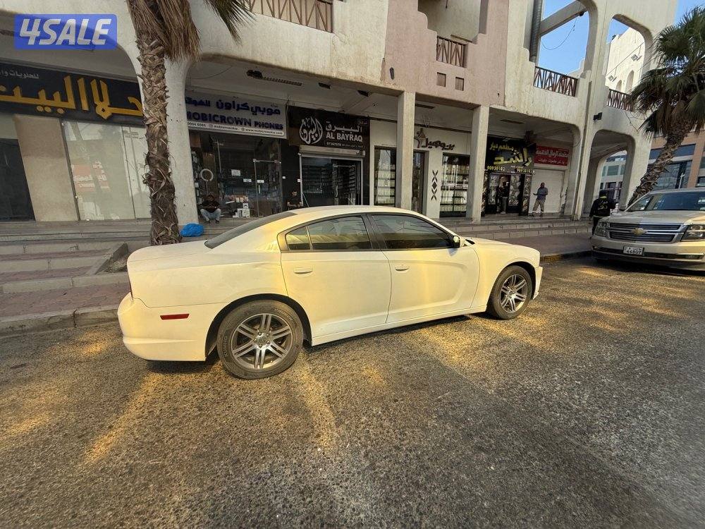 دوج شارجر 2013 بسته سلندر مع محرك V6 سعة 3.6 لتر ، بقوة 292 حصان1