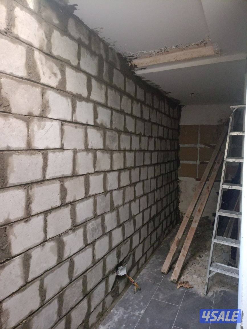 المعلم ابو زياد للمقاولات العامه بناء ومساح وتكسير وتوسيع سيجما عازل0