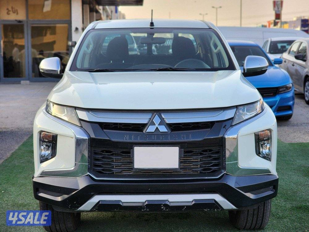 وانيت ميتسوبيشي L200 ديزل غمارتين دبل قير عادي صبغ وكالة  شرط الفحص1