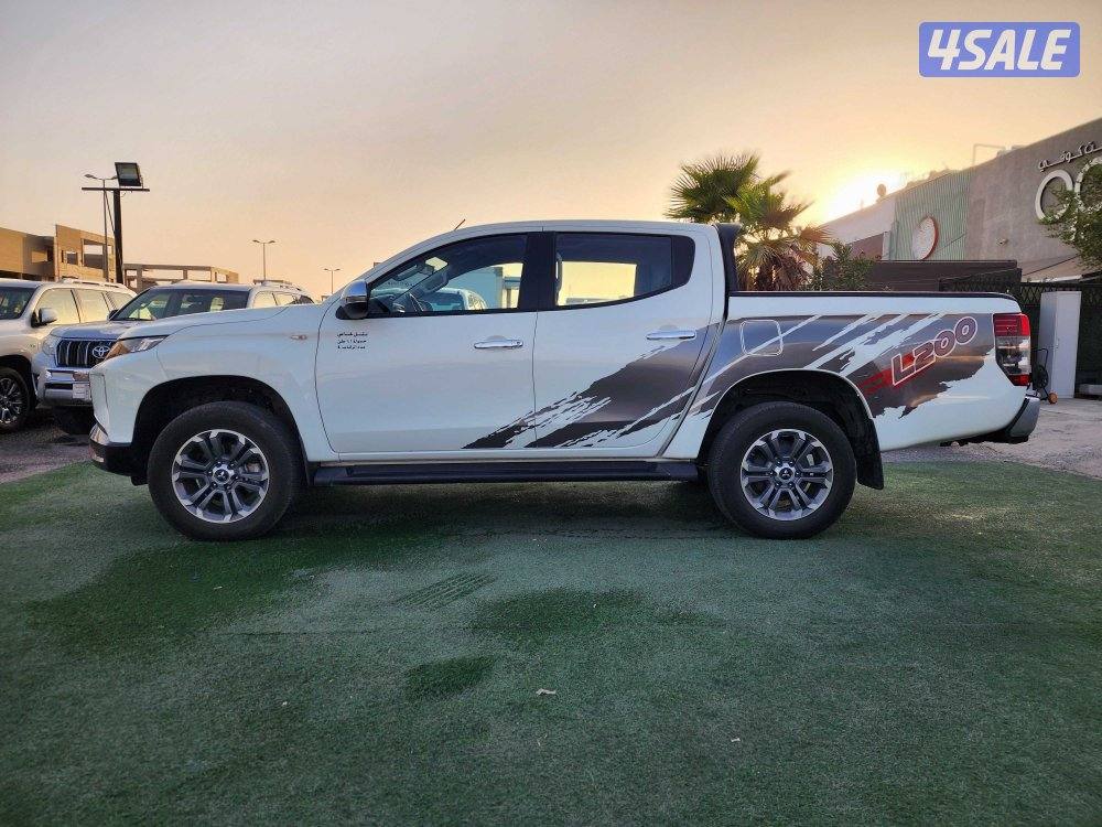 وانيت ميتسوبيشي L200 ديزل غمارتين دبل قير عادي صبغ وكالة  شرط الفحص3