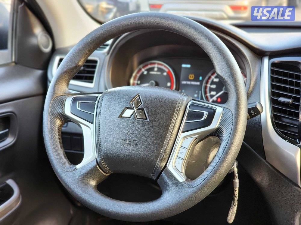 وانيت ميتسوبيشي L200 ديزل غمارتين دبل قير عادي صبغ وكالة  شرط الفحص8