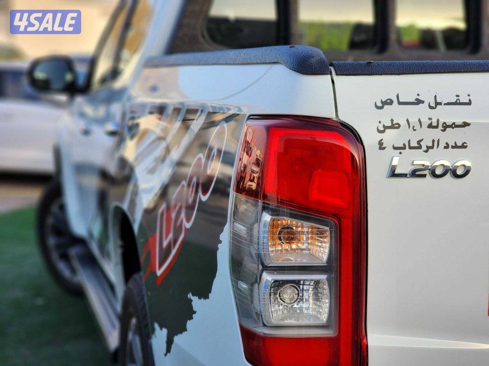 وانيت ميتسوبيشي L200 ديزل غمارتين دبل قير عادي صبغ وكالة  شرط الفحص15