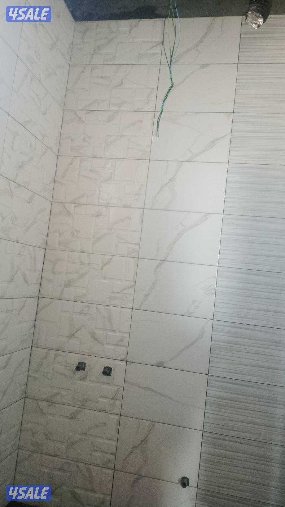 معلم باكستاني،تكيسر،تركيب،حمام،غرفة،3