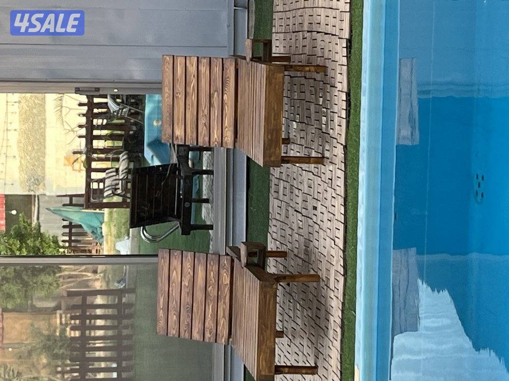 استراحة الكوخ الخشبي  للايجار اليومي الهجن كبد1