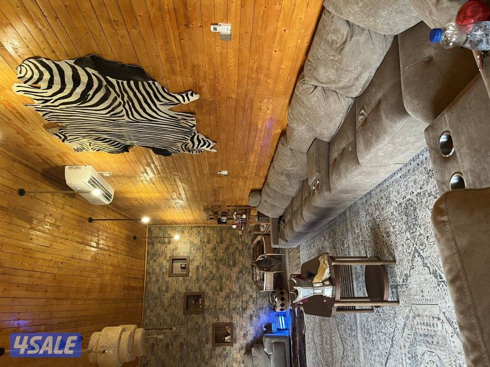 استراحة الكوخ الخشبي  للايجار اليومي الهجن كبد2