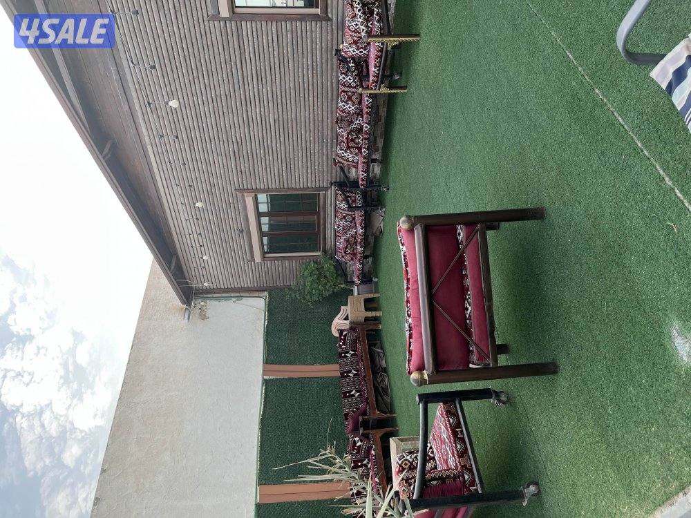 استراحة الكوخ الخشبي  للايجار اليومي الهجن كبد3