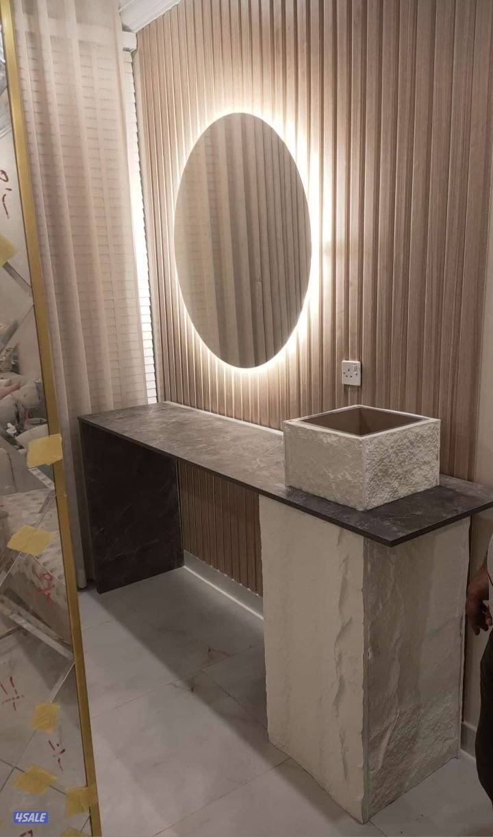 تنفذ جميع انواع الديكورات والبرتشن والجبس بورد0