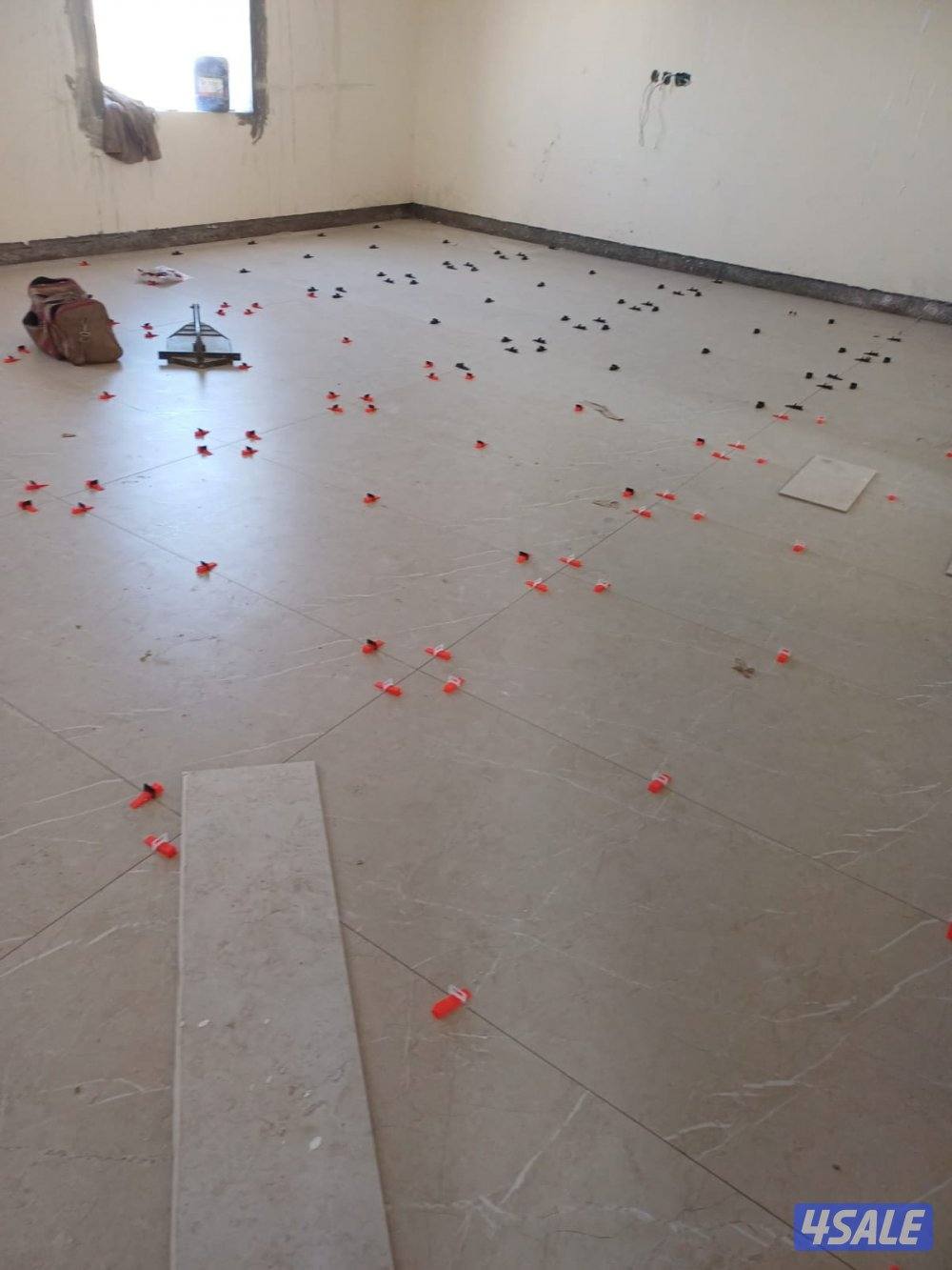 معلم باكستاني تركيب سيراميك بلاط جرانيت7