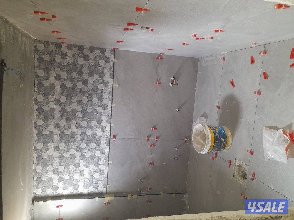 معلم باكستاني تركيب سيراميك بلاط جرانيت10