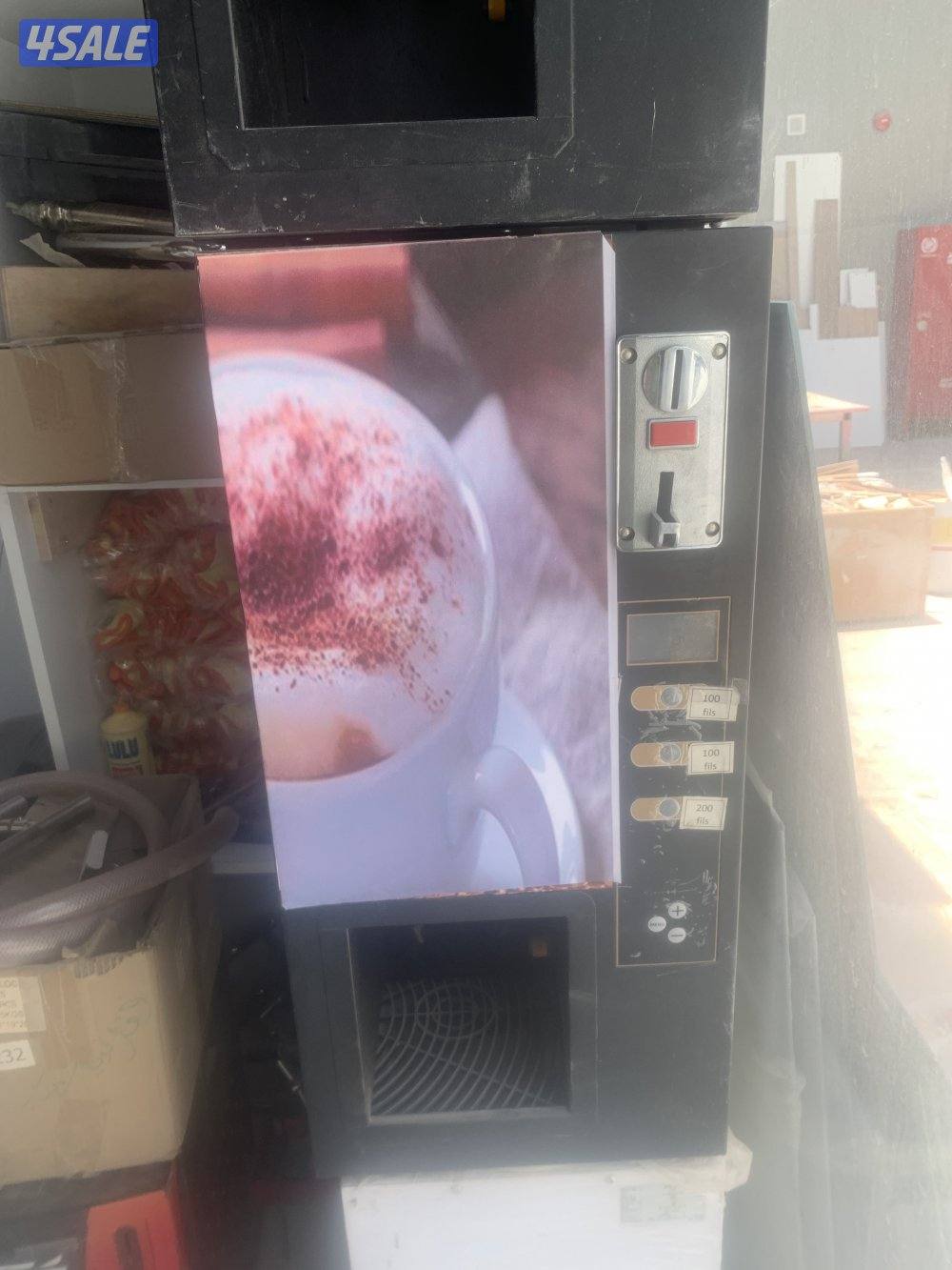 ماكينه بيع المشروبات الذاتيه بالعمله الحديديه0