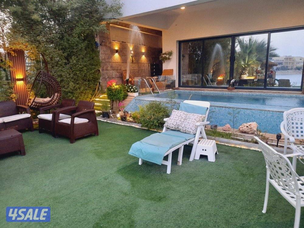 شاليه للايجار بصباح الأحمد صف اول حمام سباحة 6 غرف حديقة8