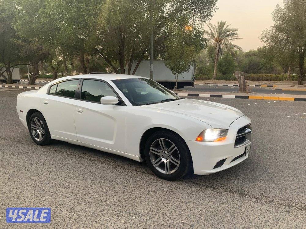 للبيع دودج شارجر 2013 عداد 335 فحص V6 الو صدفي مكيف ثلج جاهز مجهز من ا13