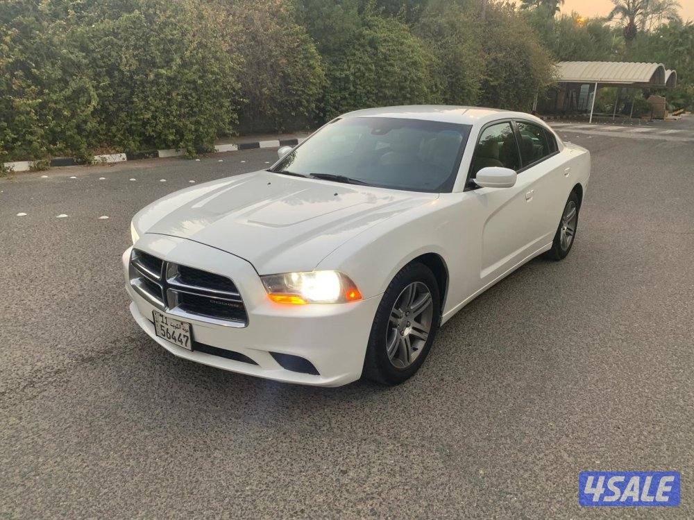 للبيع دودج شارجر 2013 عداد 335 فحص V6 الو صدفي مكيف ثلج جاهز مجهز من ا14