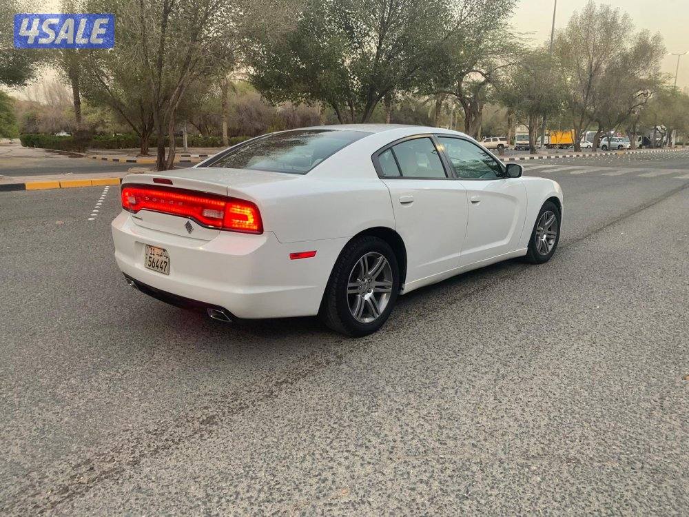 للبيع دودج شارجر 2013 عداد 335 فحص V6 الو صدفي مكيف ثلج جاهز مجهز من ا15