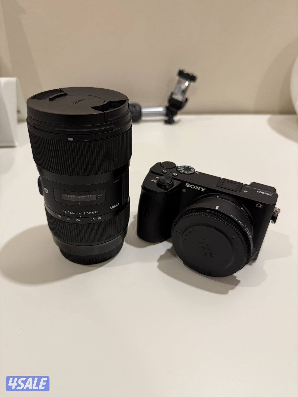 للبيع كاميرا Sony a6600 استخدام خفيف مع عدسة Sigma 18-353