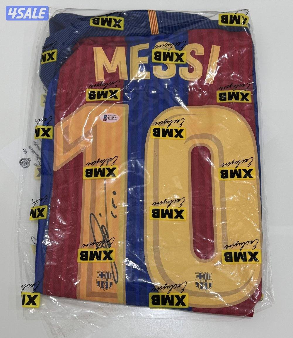 قميص موقع من الاعب ليونيل ميسي1