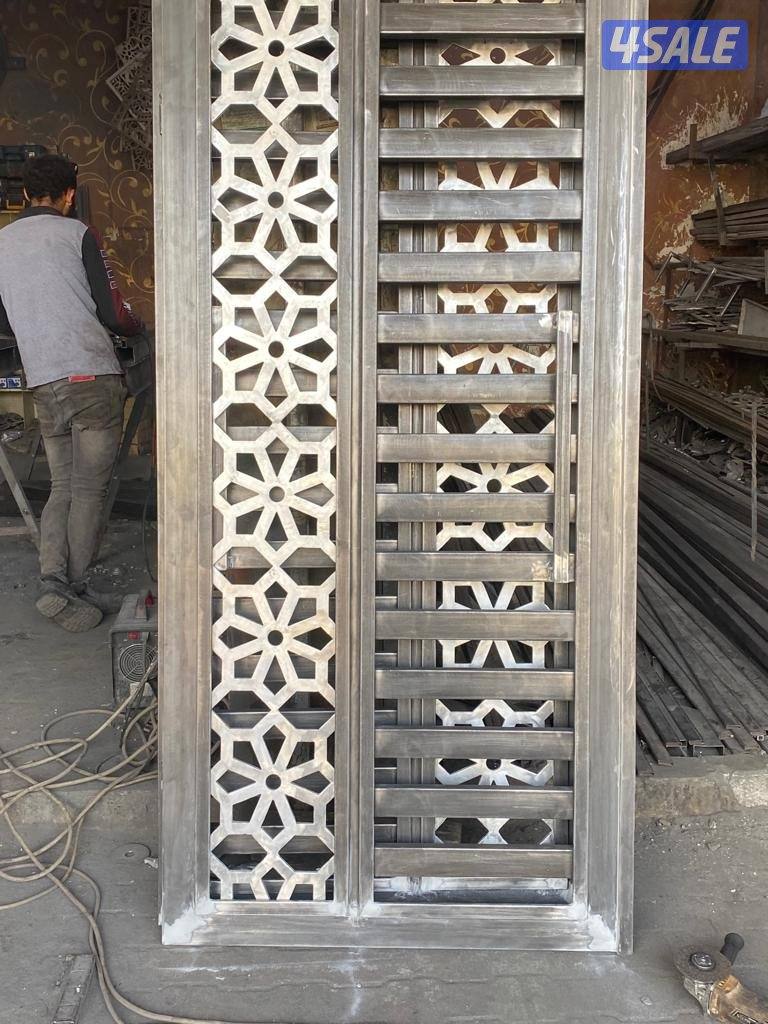 حداد مظلات وابواب وشبرات  وسلالم وكل ما يخص اعمال الحديد14