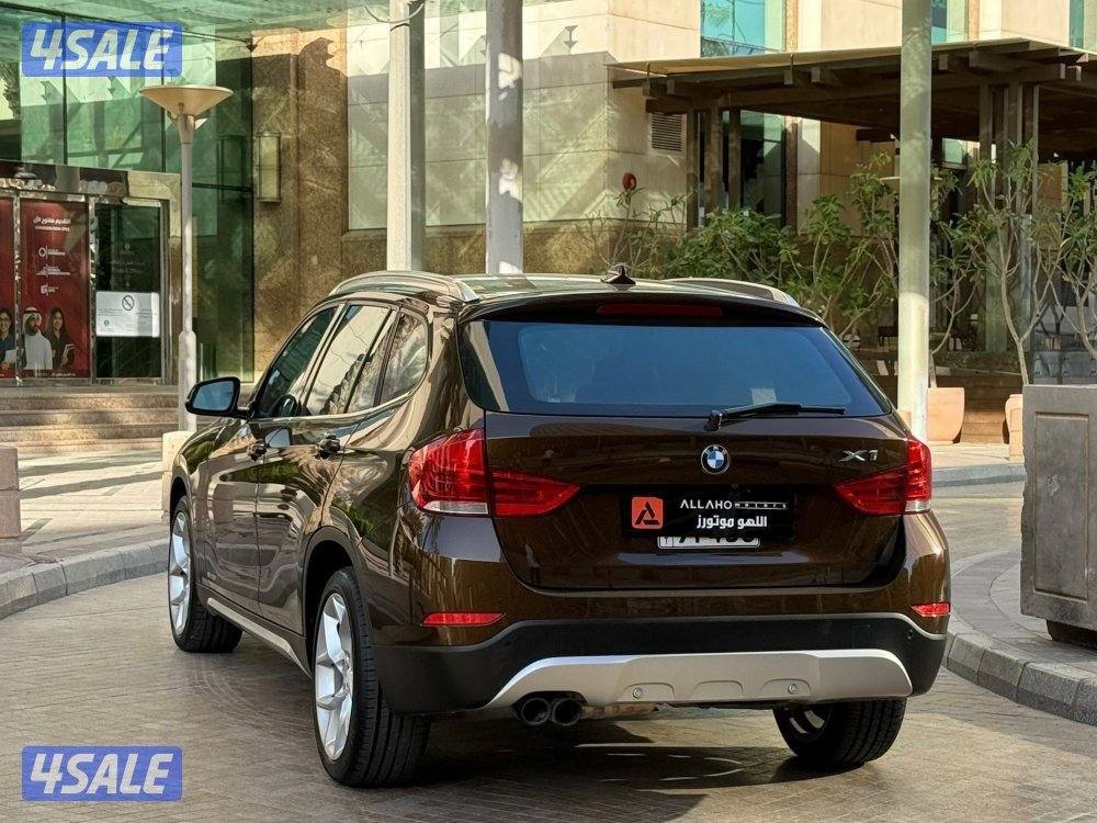 بي ام دبليوX1 V6موديل2015 عداد138الف وارد امريكا سيرفس منتظم في الغانم2