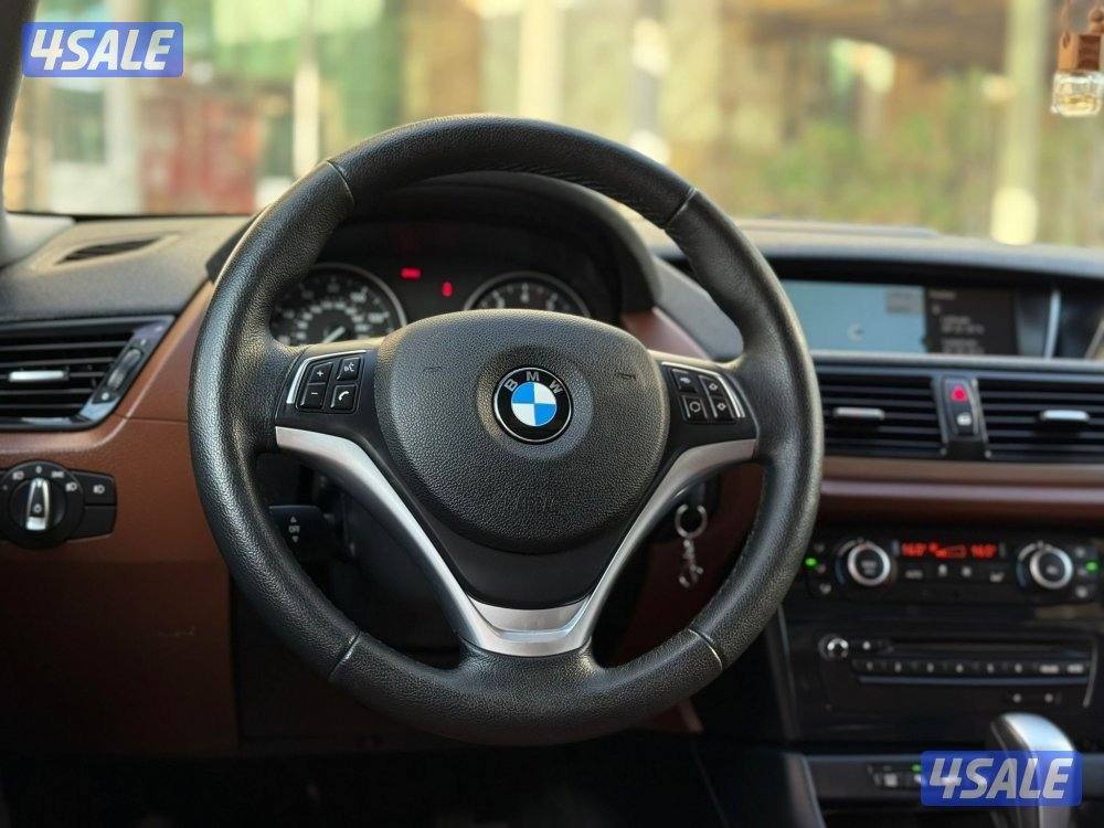 بي ام دبليوX1 V6موديل2015 عداد138الف وارد امريكا سيرفس منتظم في الغانم4