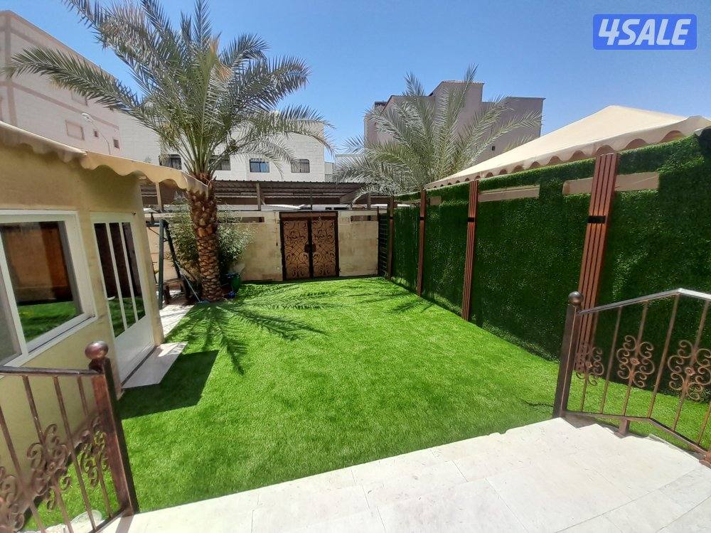 تركيب السياج التركي الأصلي وتركيب الثيل الصناعي وقص الأشجار3