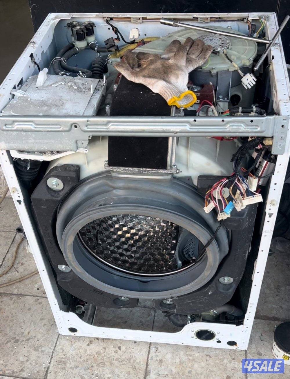 تصليح غسالة ونشافة مع ضمان فني باكستاني خدمة ٢٤/٧2