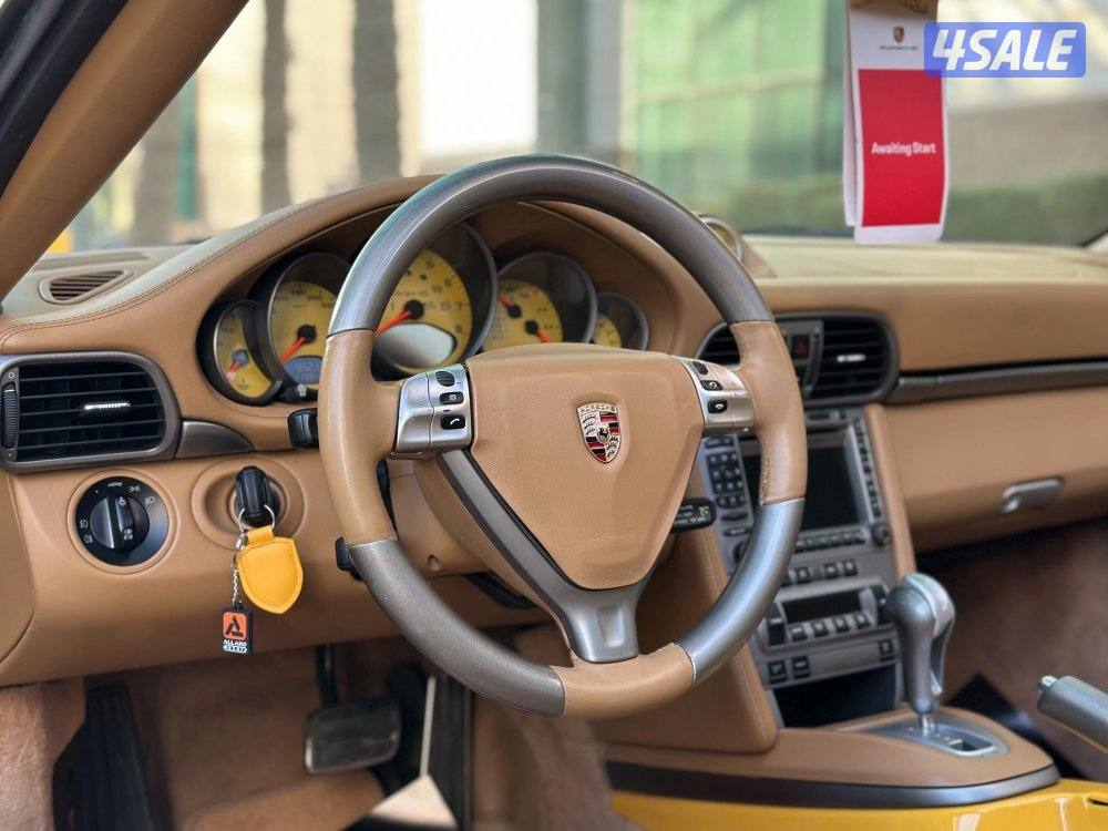 بورشه كريراTARGA4 موديل2007 عداد95الف وارد بهبهاني بحاله نادره5