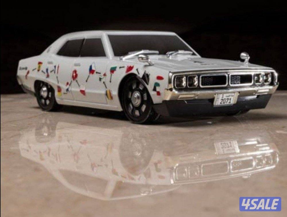 سيارة جي تي ٧٧ ريموت كنترول+ بلوتوث +استيكرات+ تواير اسبير2