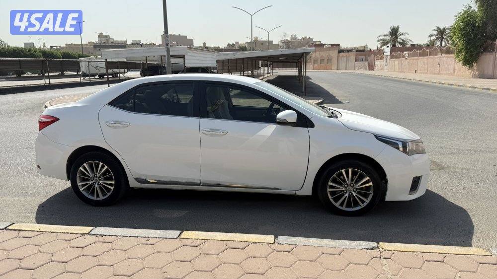 كورولا 2014 ماشيه 399 الف2