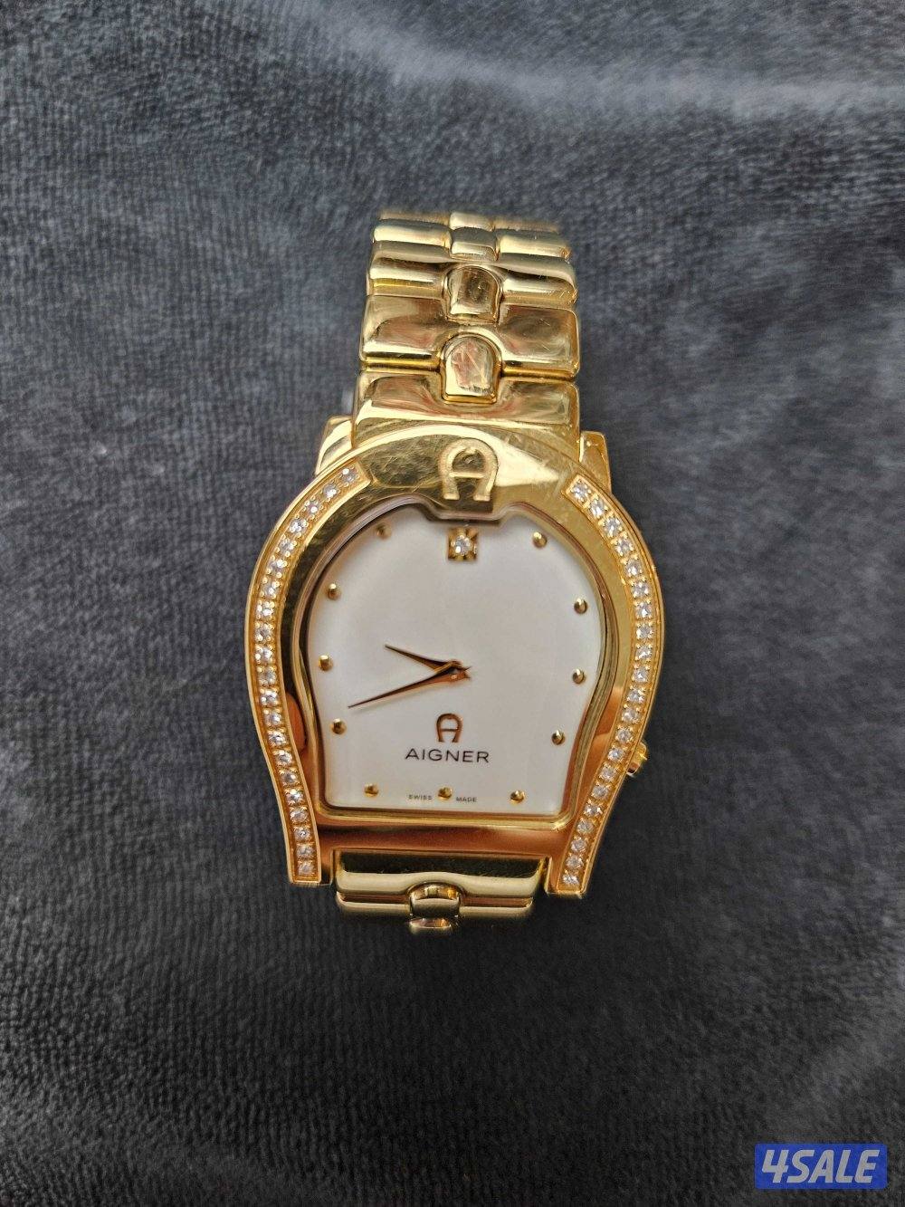 ساعة ايغنر نادرة مطلية ذهب ومرصعة الماس0
