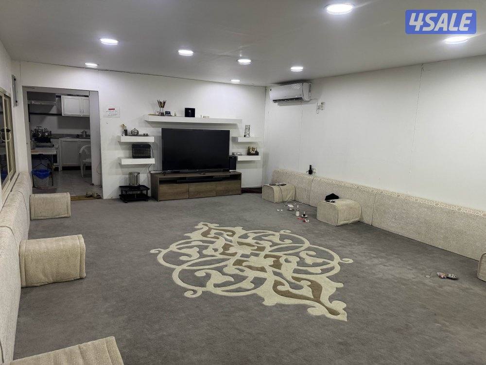 خلف اسطبلات الأحمدي الوفره قريب من منطقة ام الهيمان9