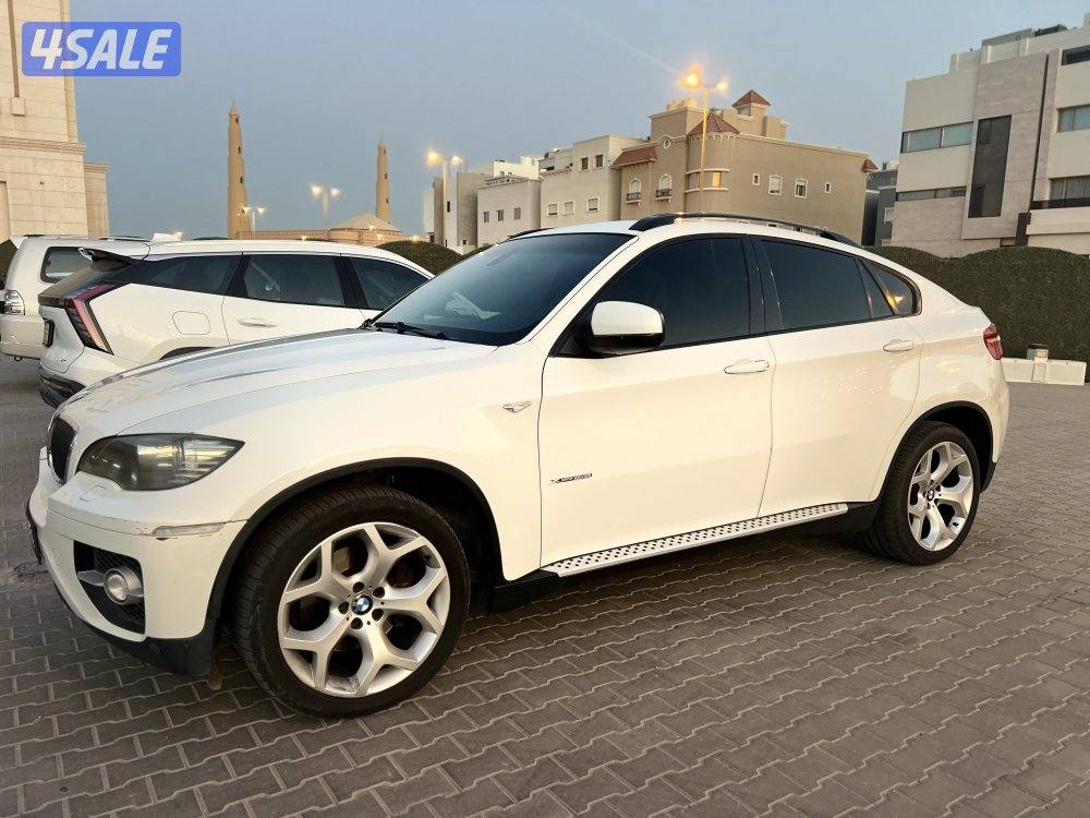 للبيع BMW X6 موديل 2009 أبيض من داخل تان صبغ الوكاله2