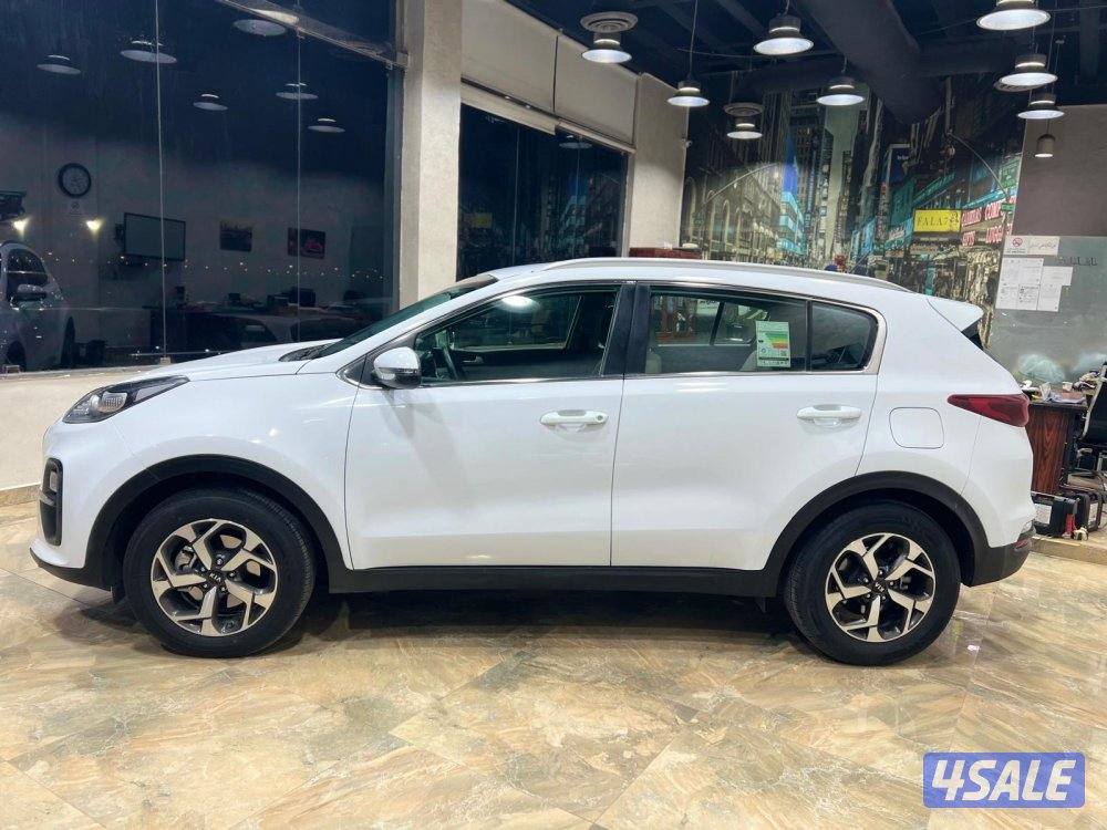 كيا سبورتاج موديل 2021 ماشي 55 الف بحالة الوكالة1