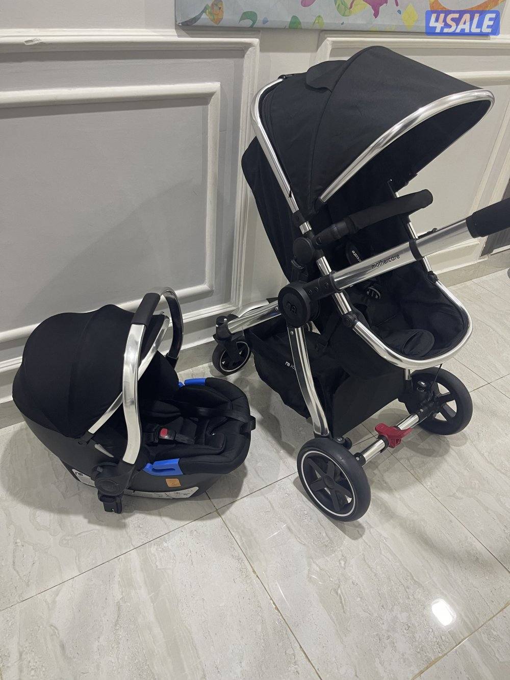 عربانه اطفال شاريتها جديدة مستخدمتها ٣ مرات فقط عربانه مع كرسي سيارة3