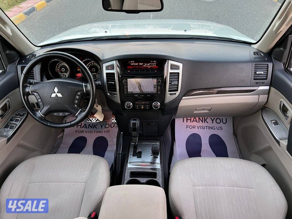 باجيرو 2022 فل اوبشن فتحه وثلاجه وخريطه لون صدفي بحاله الوكاله8