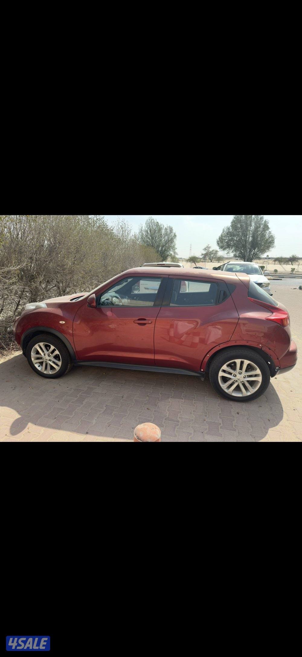 نيسان جوك ٢٠١٢ أحمر نظيف0