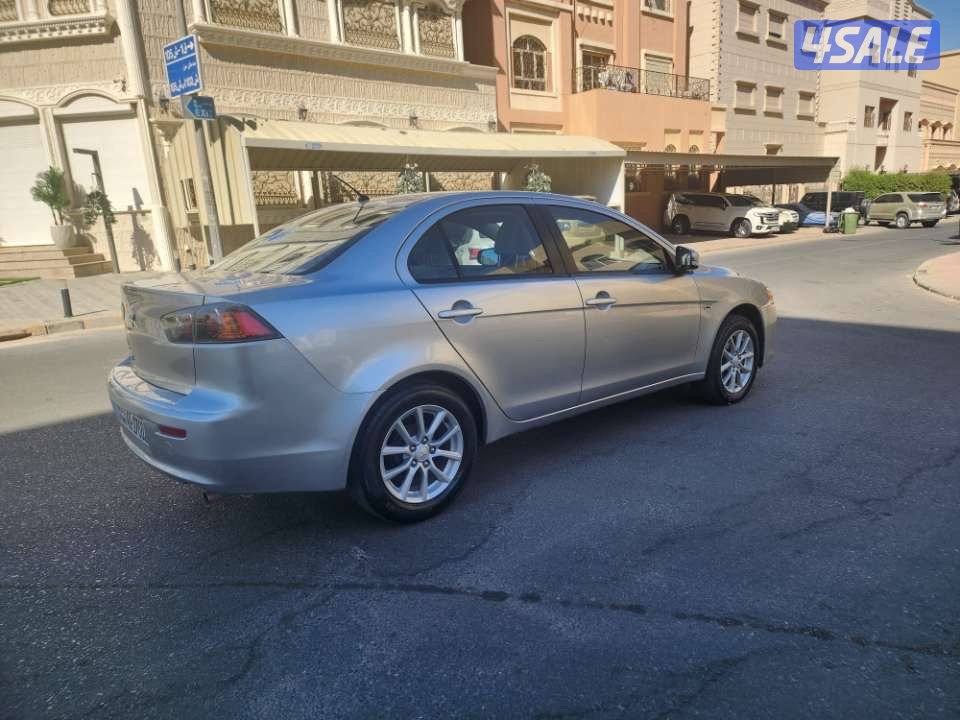 لانسر EX  موديل 2016 ماشية ١٨٩  الف شرط الفحص1