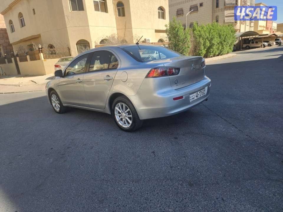 لانسر EX  موديل 2016 ماشية ١٨٩  الف شرط الفحص3