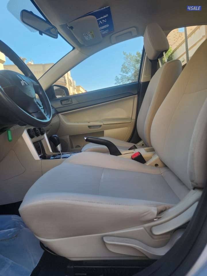 لانسر EX  موديل 2016 ماشية ١٨٩  الف شرط الفحص5