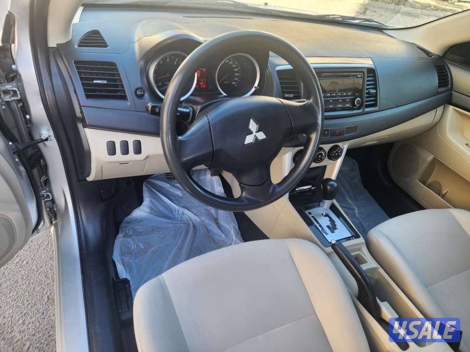 لانسر EX  موديل 2016 ماشية ١٨٩  الف شرط الفحص7