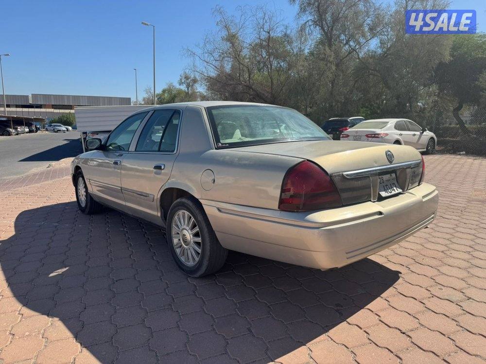 جراند ماركيز 2008 ذهبي1