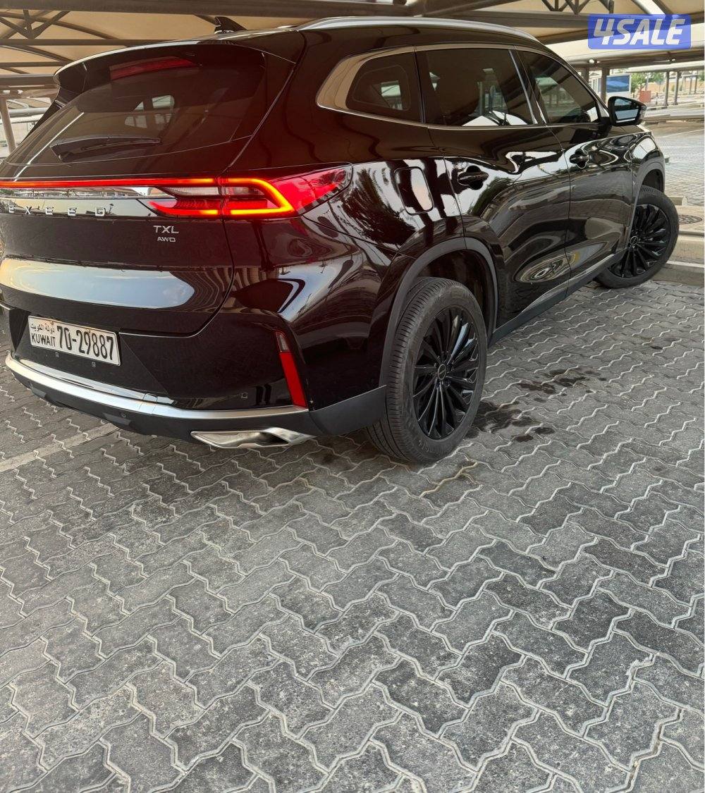 سيارة Exeed TXL للبيع لون اسود، بحالة ممتازه على كفالة الوكالة1